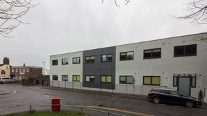 A modern building with multiple windows and a flat facade. - Trafalgar House (Stoke-on-Trent)