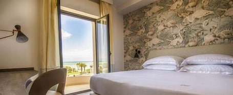 Premium bedding, minibar, in-room safe, desk. Ghibli Hotel