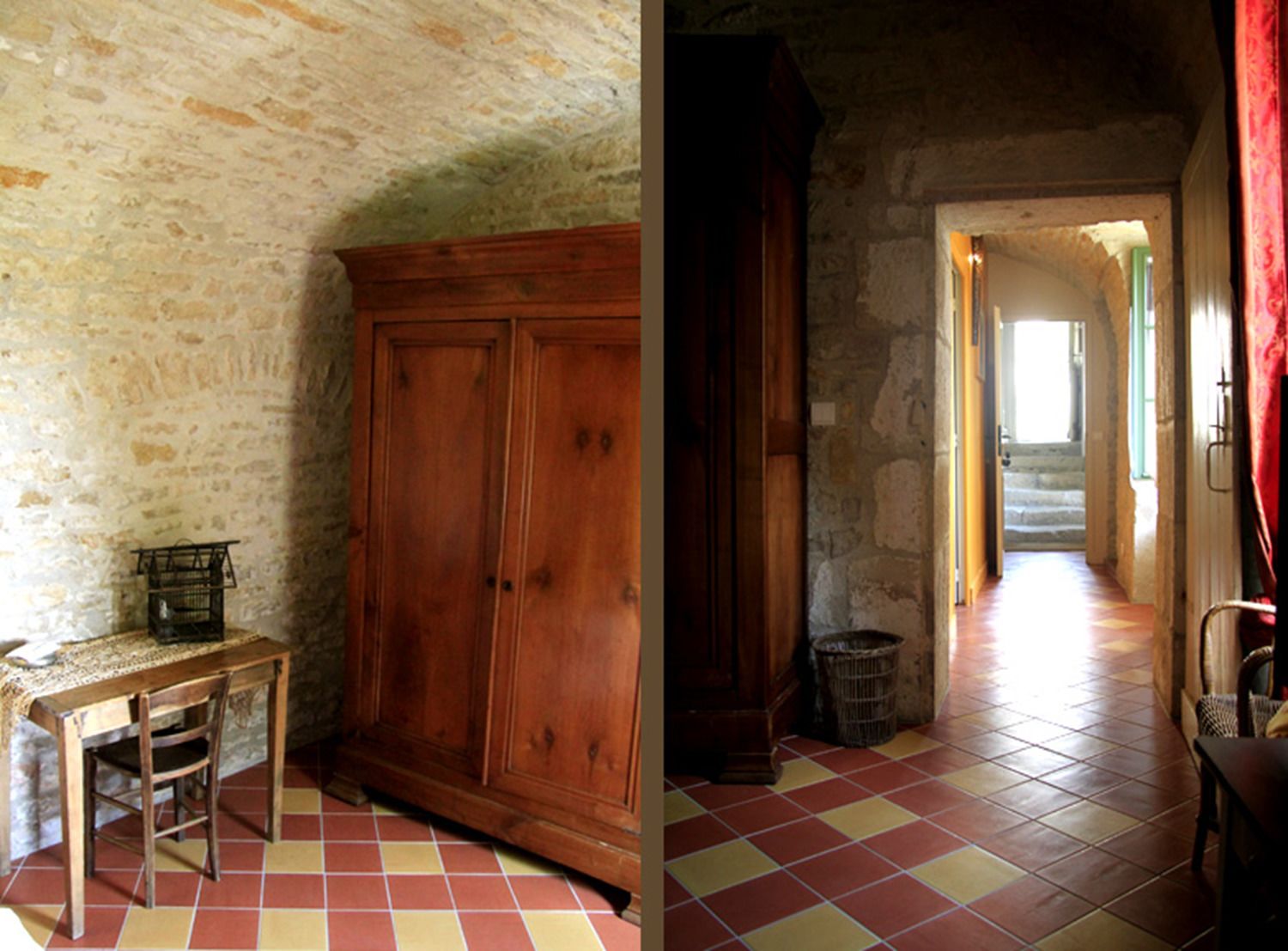 A room with a wooden wardrobe, a small table with a chair, and a tiled floor.