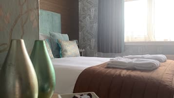 Premium bedding, down comforters, individually decorated