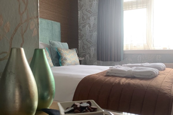 Premium bedding, down comforters, desk, laptop workspace