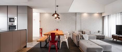 Deluxe Apartment, 4 Bedrooms, Terrace | Living area | Flat-screen TV