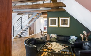 Departamento superior, 4 habitaciones, 2 baños, vista al resort | Área de sala de estar | Televisión de pantalla plana 