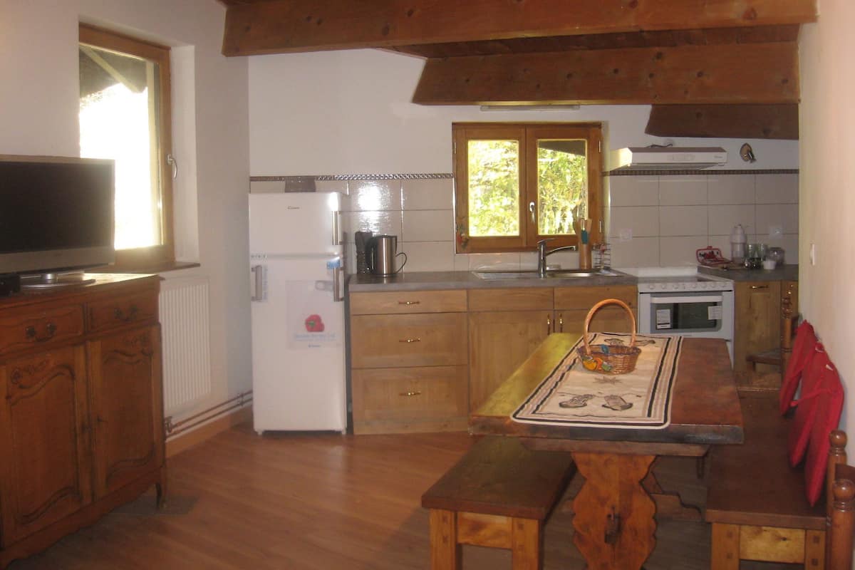 Departamento (Le Grand Roc) | Cocina privada | Refrigerador con congelador, microondas, horno y lavavajillas