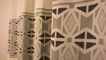 A series of curtains with geometric patterns.