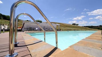 Seasonal outdoor pool, pool umbrellas, sun loungers