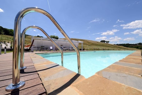 Seasonal outdoor pool, pool umbrellas, sun loungers