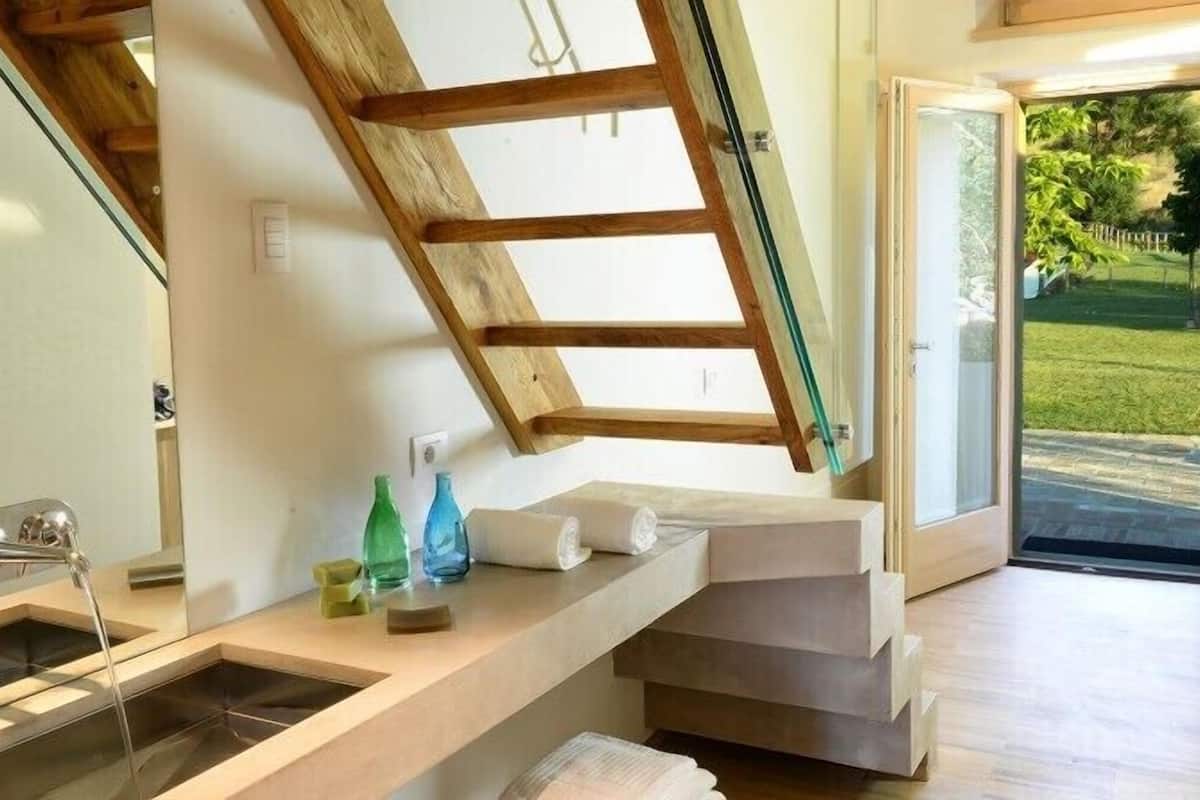 2 habitaciones, ropa de cama de alta calidad, minibar y escritorio