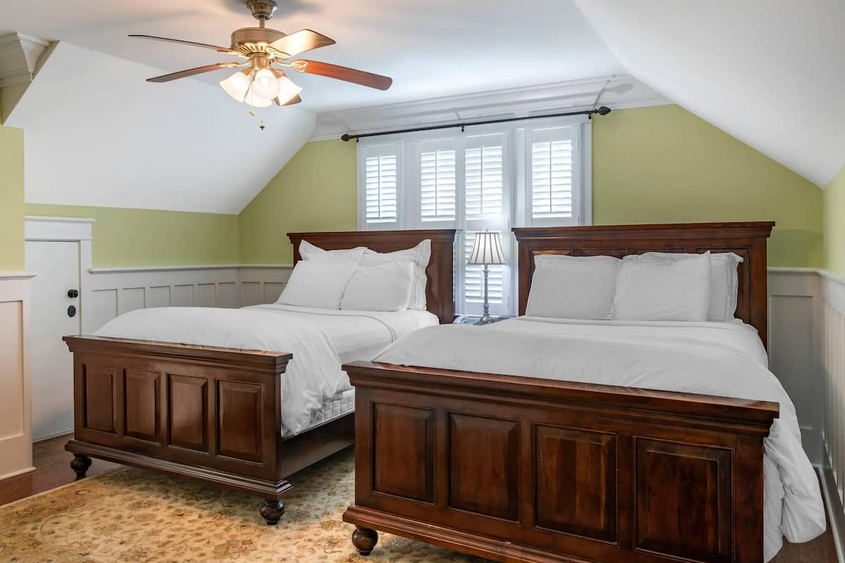 Room, 2 Queen Beds, Non Smoking | Individually decorated, individually furnished, iron/ironing board