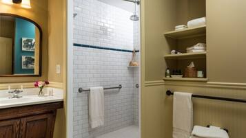 Designer toiletries, hair dryer, bathrobes, towels