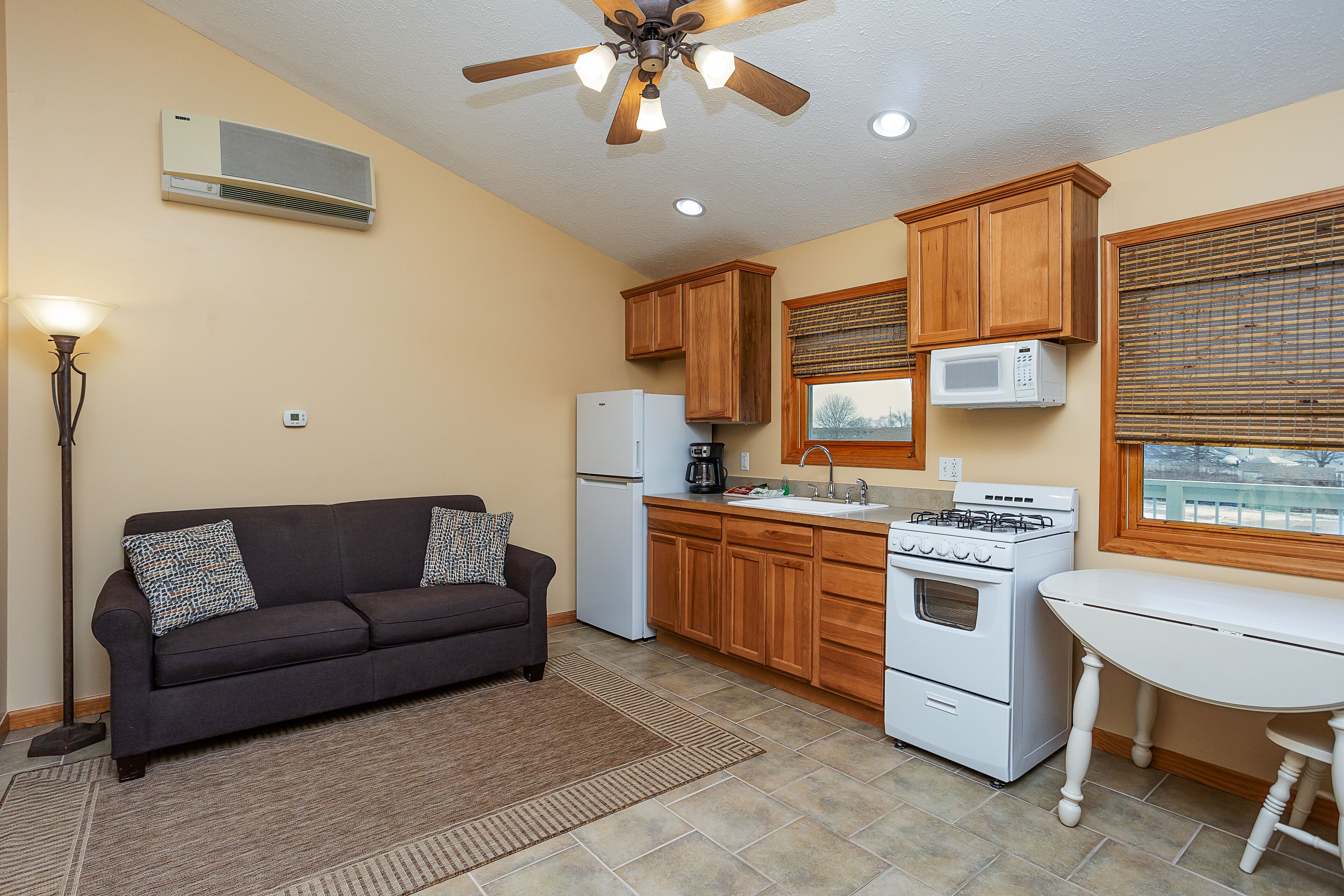 two bedroom queen/jetted tub suite 21 | living area | flat-screen tv