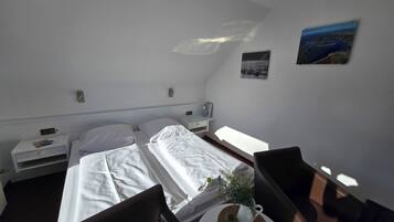 Coffres-forts dans les chambres, Wi-Fi gratuit, draps fournis