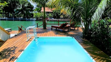 Outdoor pool, pool umbrellas, pool loungers