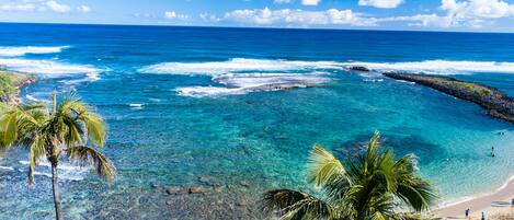 On the beach, sun loungers, beach towels