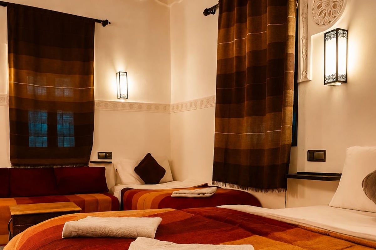 Premium bedding, blackout curtains, iron/ironing board (on request)