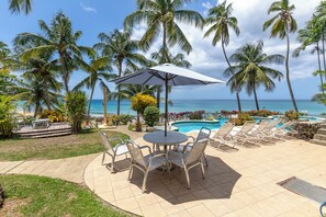 Outdoor dining - Chaconia Suite, a stunning luxurious beach front self catering apartment (Black Rock)