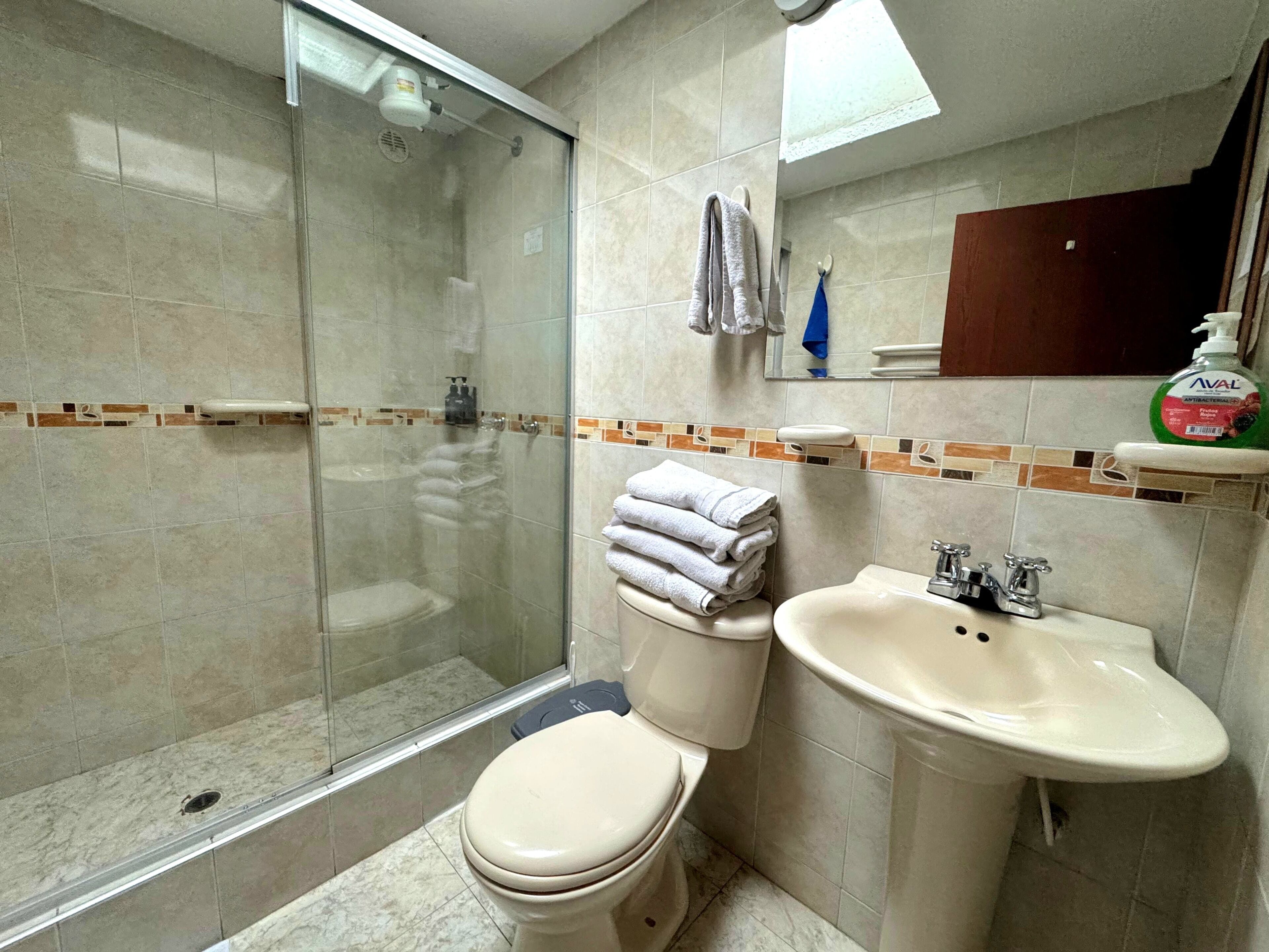 quadruple room | bathroom | shower, rainfall showerhead, free toiletries, hair dryer