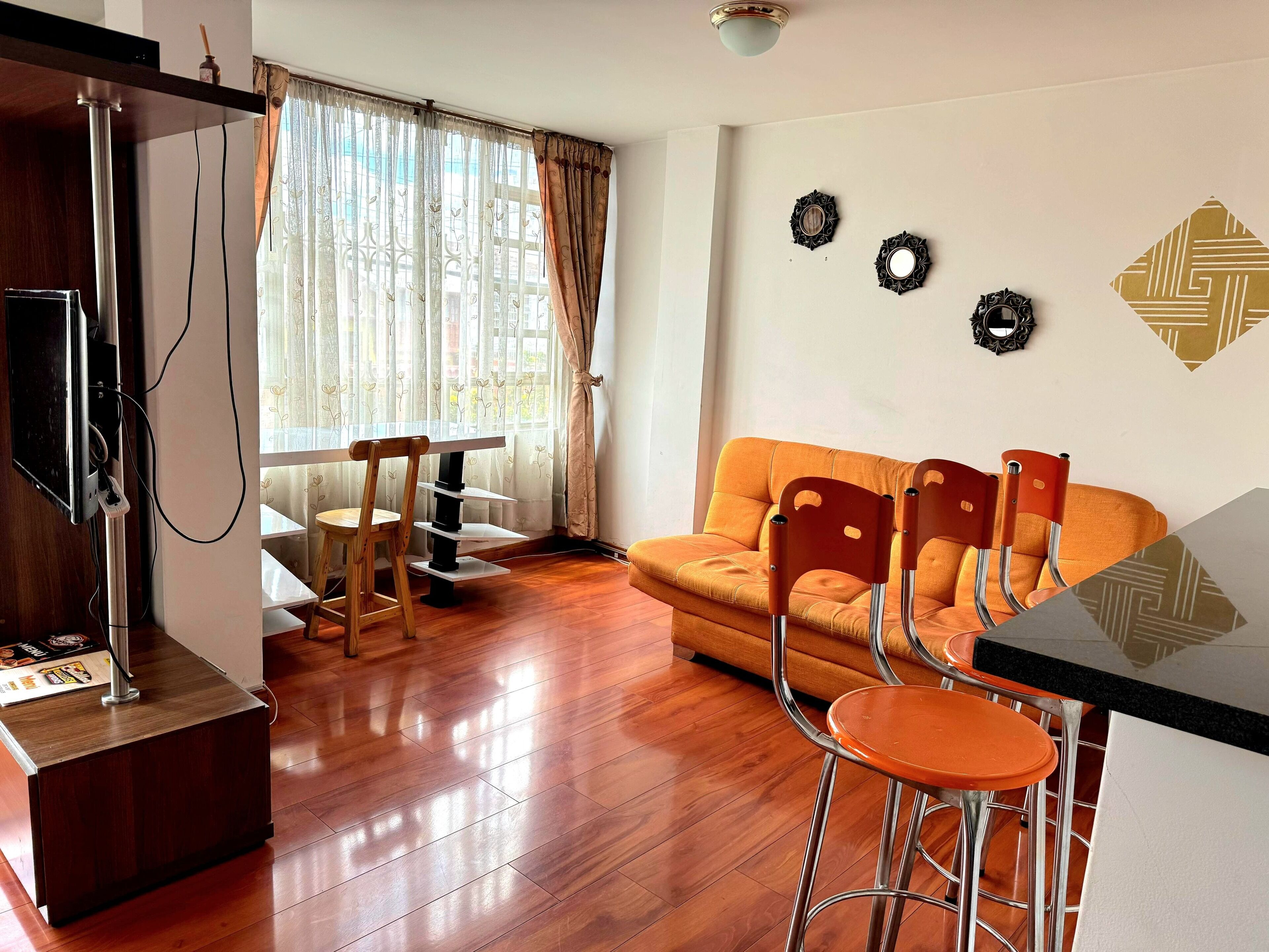 aparta estudio | living area | 36-inch flat-screen tv with cable channels, tv