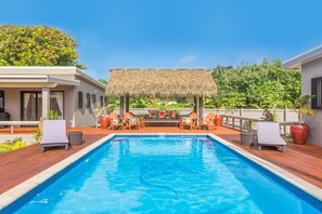 Outdoor pool, open 8 AM to 9 PM, pool loungers - Cook Islands Holiday Villas Turangi (Rarotonga)