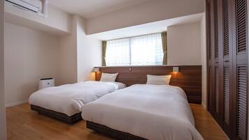 2 habitaciones, escritorio, wifi gratis y ropa de cama