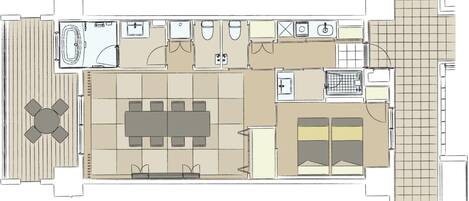 Plano de planta de un hotel que muestra un comedor, una cocina, un baño y una pequeña zona de estar exterior.