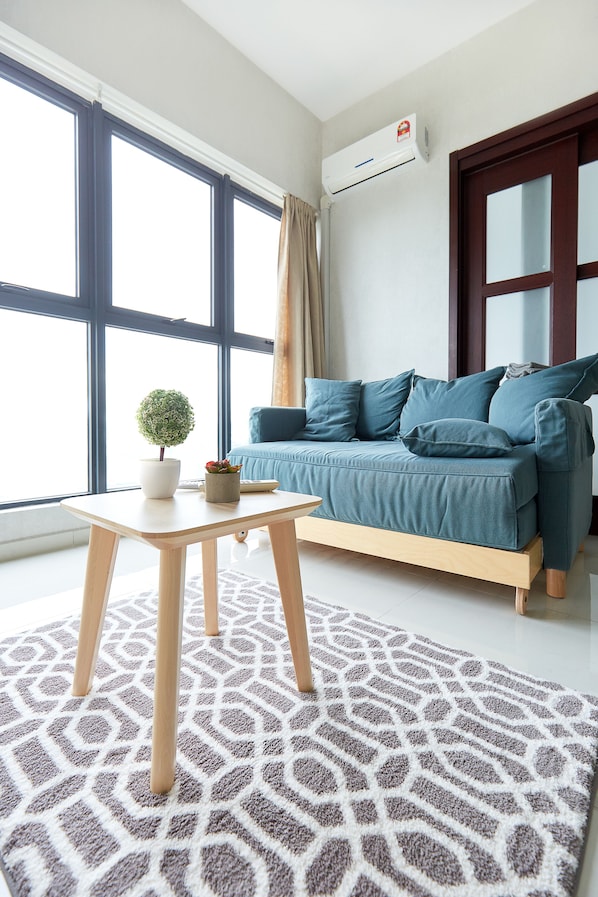 Studio, 1 Bedroom | Living area | Flat-screen TV