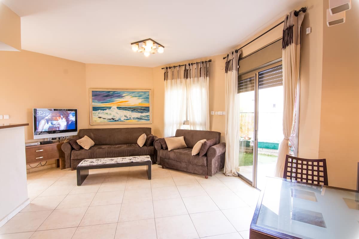 Family Apartment, 2 Bedrooms, Smoking, City View | 1 bedroom, in-room safe, desk, iron/ironing board