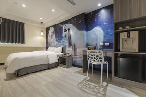 A modern hotel room with a bed, a desk, and a water dispenser. - The Young Hotel Taoyuan (Taoyuan City)