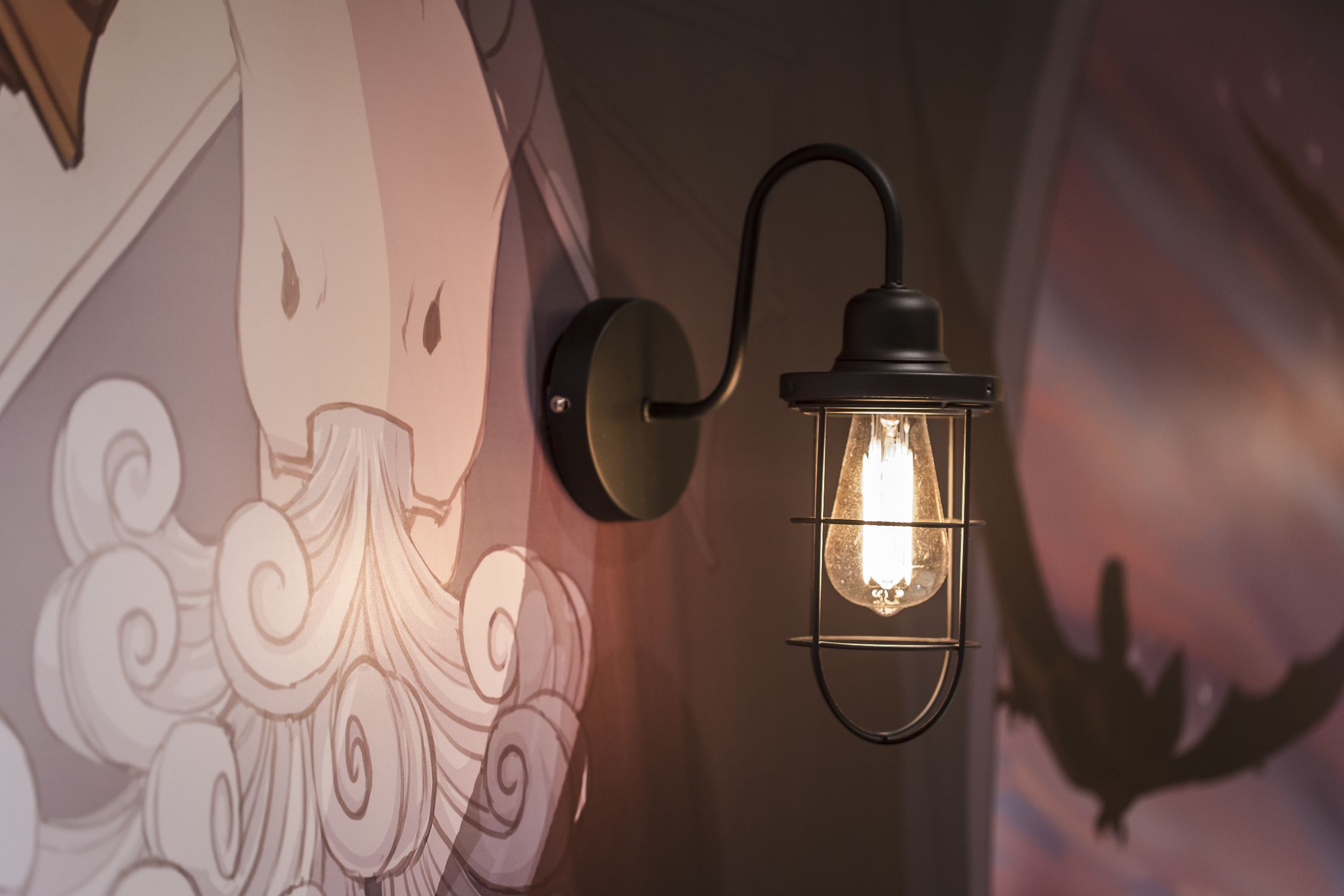 A wall-mounted light fixture with a visible bulb.