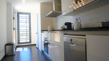 Apartment, 3 Bedrooms, Terrace, Partial Sea View | Private kitchenette | Full-size fridge, microwave, oven, stovetop