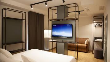 Junior Suite, 1 Queen Bed with Sofa bed, Kitchenette | Minibar, in-room safe, soundproofing, cribs/infant beds