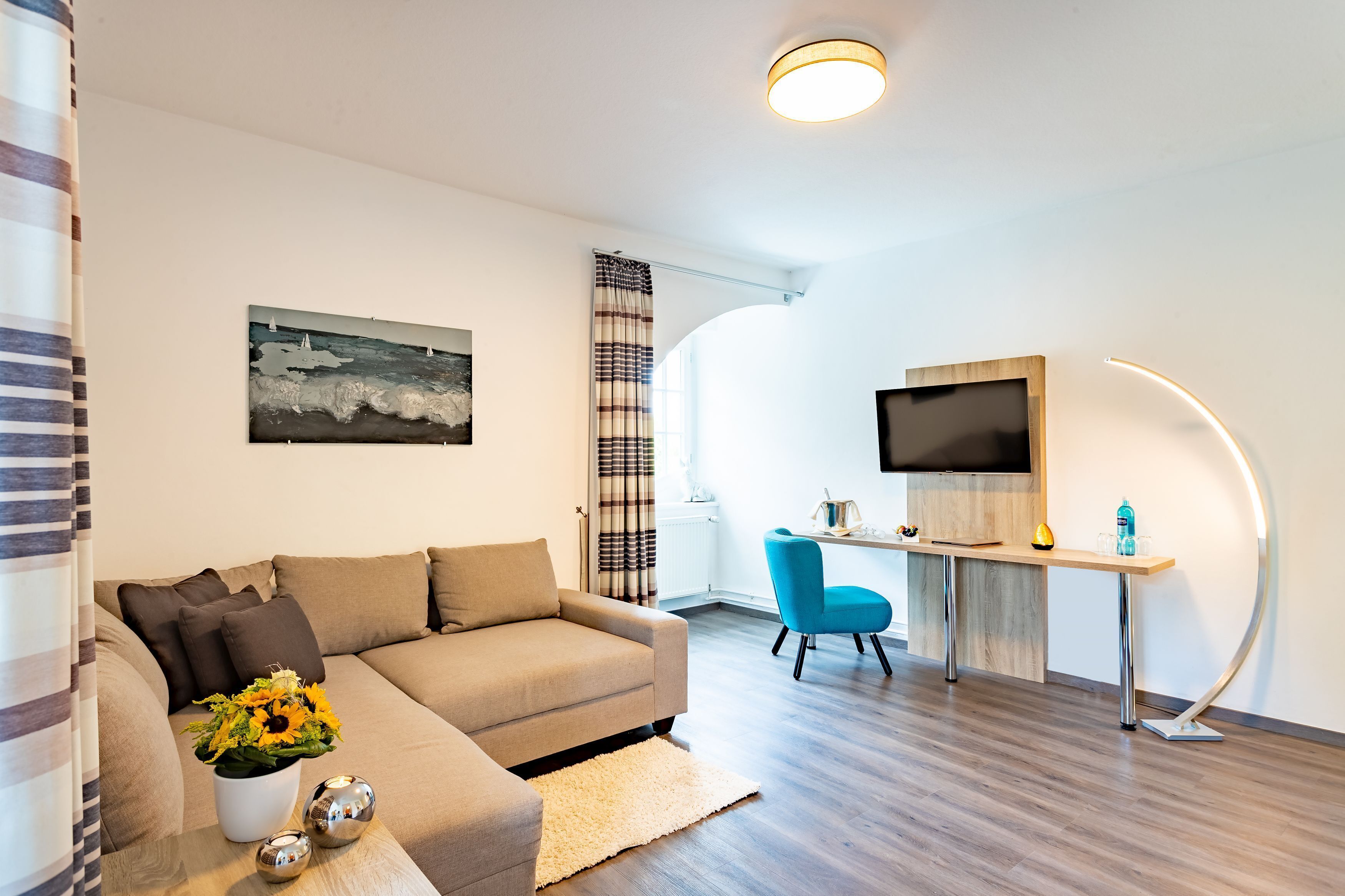 senior suite | in-room safe, desk, blackout curtains, iron/ironing board