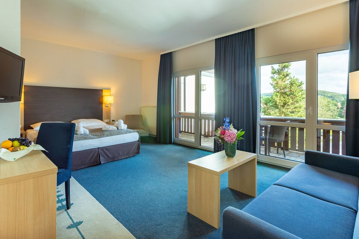 junior suite | hypo-allergenic bedding, desk, blackout curtains, soundproofing