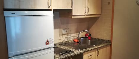 Apartment, 1 Bedroom, Balcony | Private kitchen | Full-size fridge, microwave, oven, stovetop