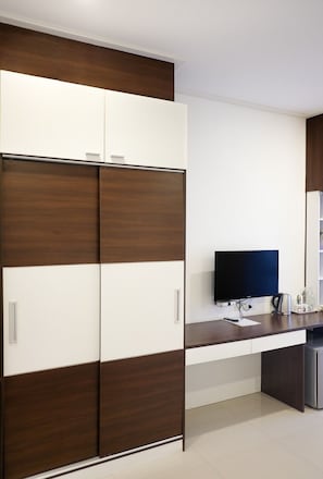 Cortinas blackout, Wi-Fi de cortesia, roupa de cama