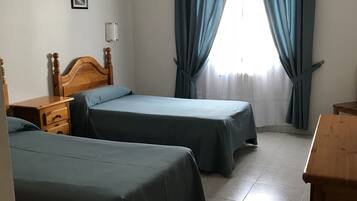 Desk, blackout drapes, free cribs/infant beds, rollaway beds