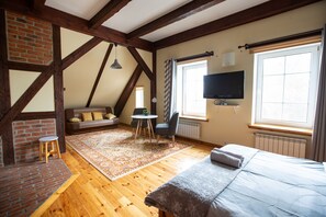 Studio Suite Comfort | Area keluarga | Televisi layar datar 30-inci dengan saluran TV kabel dan TV