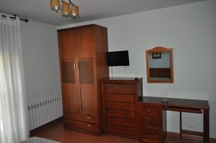 Desk, blackout drapes, rollaway beds, free WiFi