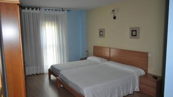 Desk, blackout curtains, rollaway beds, free WiFi