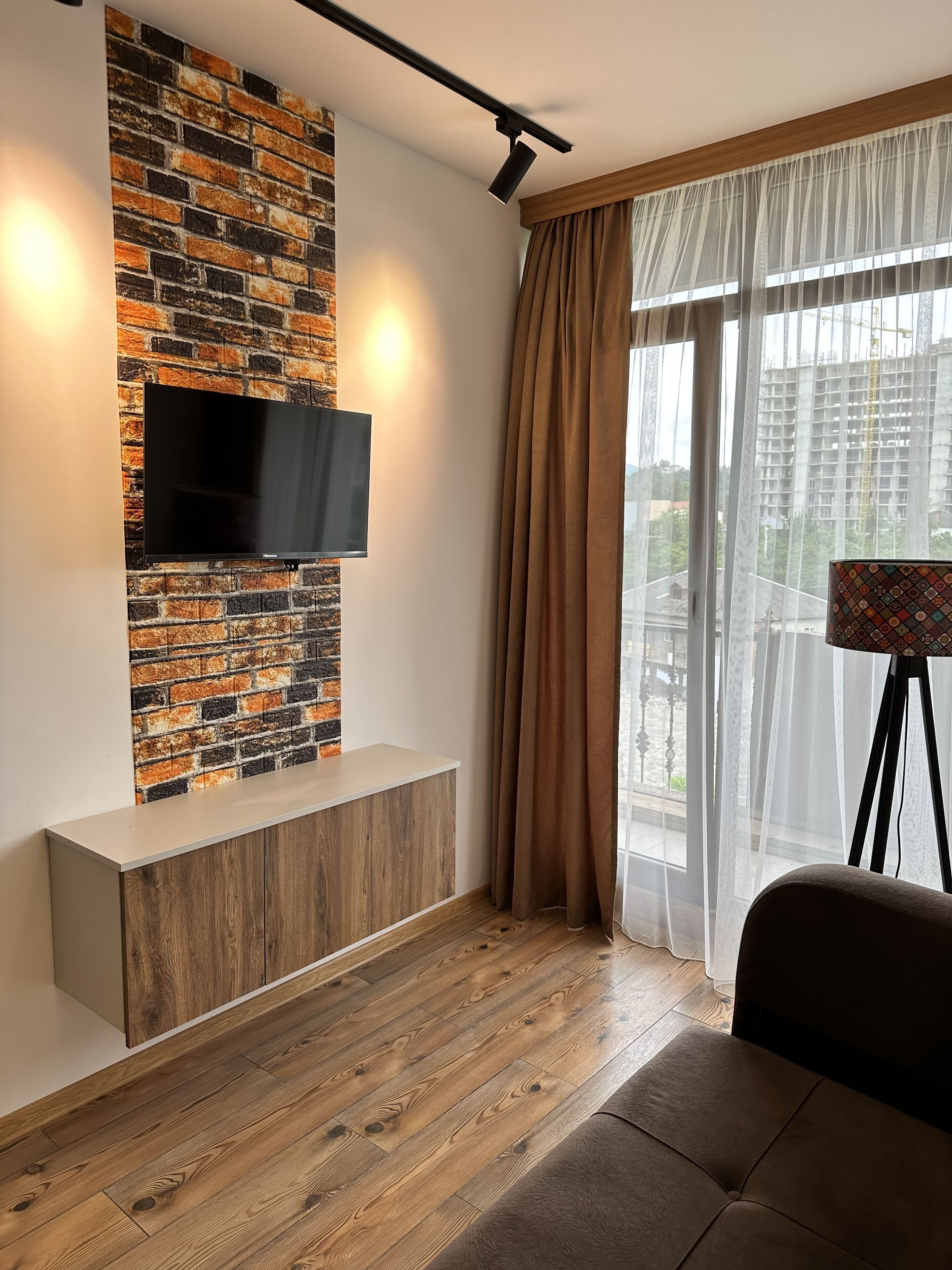 Luxury Suite, Balcony | Living area | Smart TV