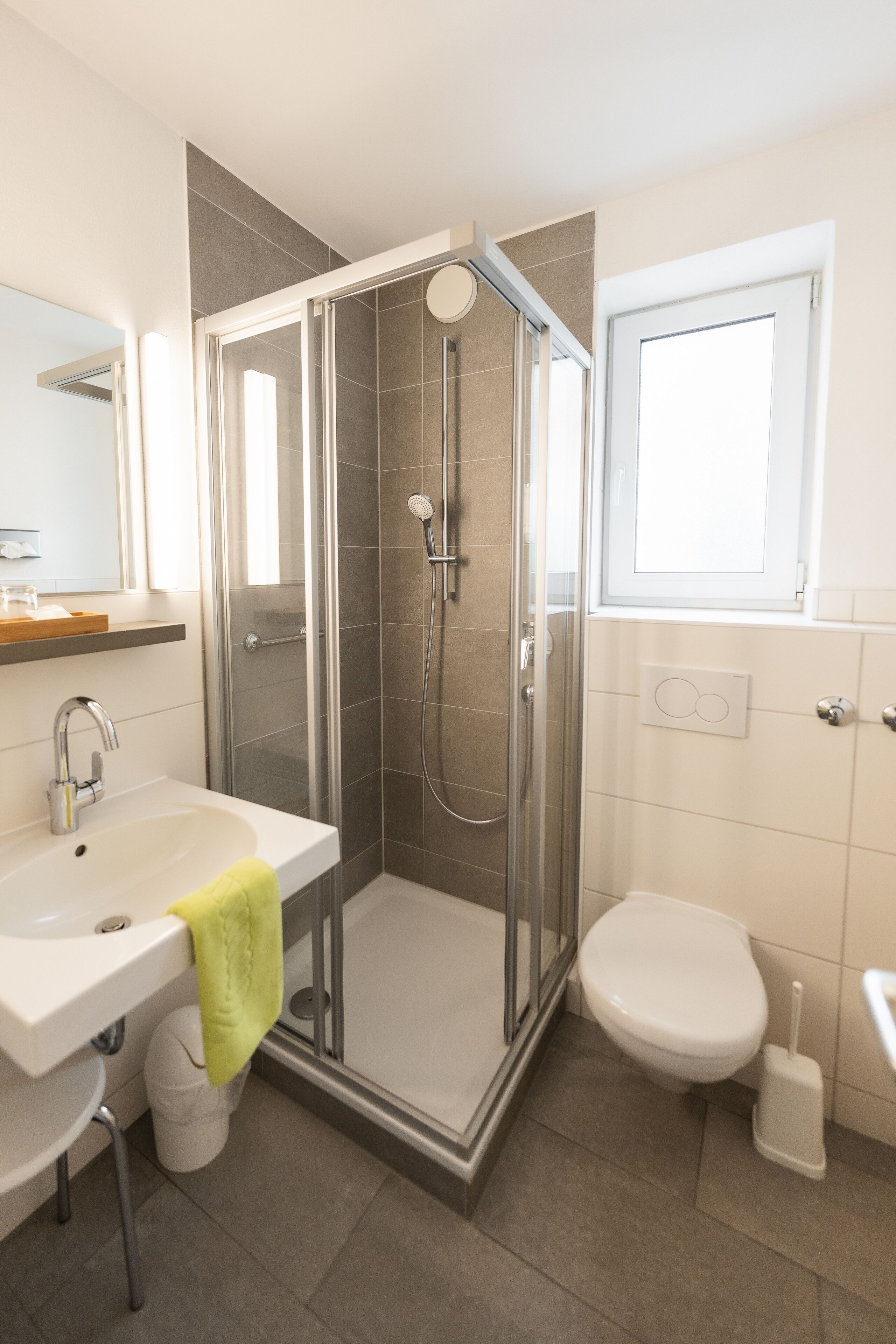 standard single room | bathroom | shower, hair dryer, bathrobes, towels