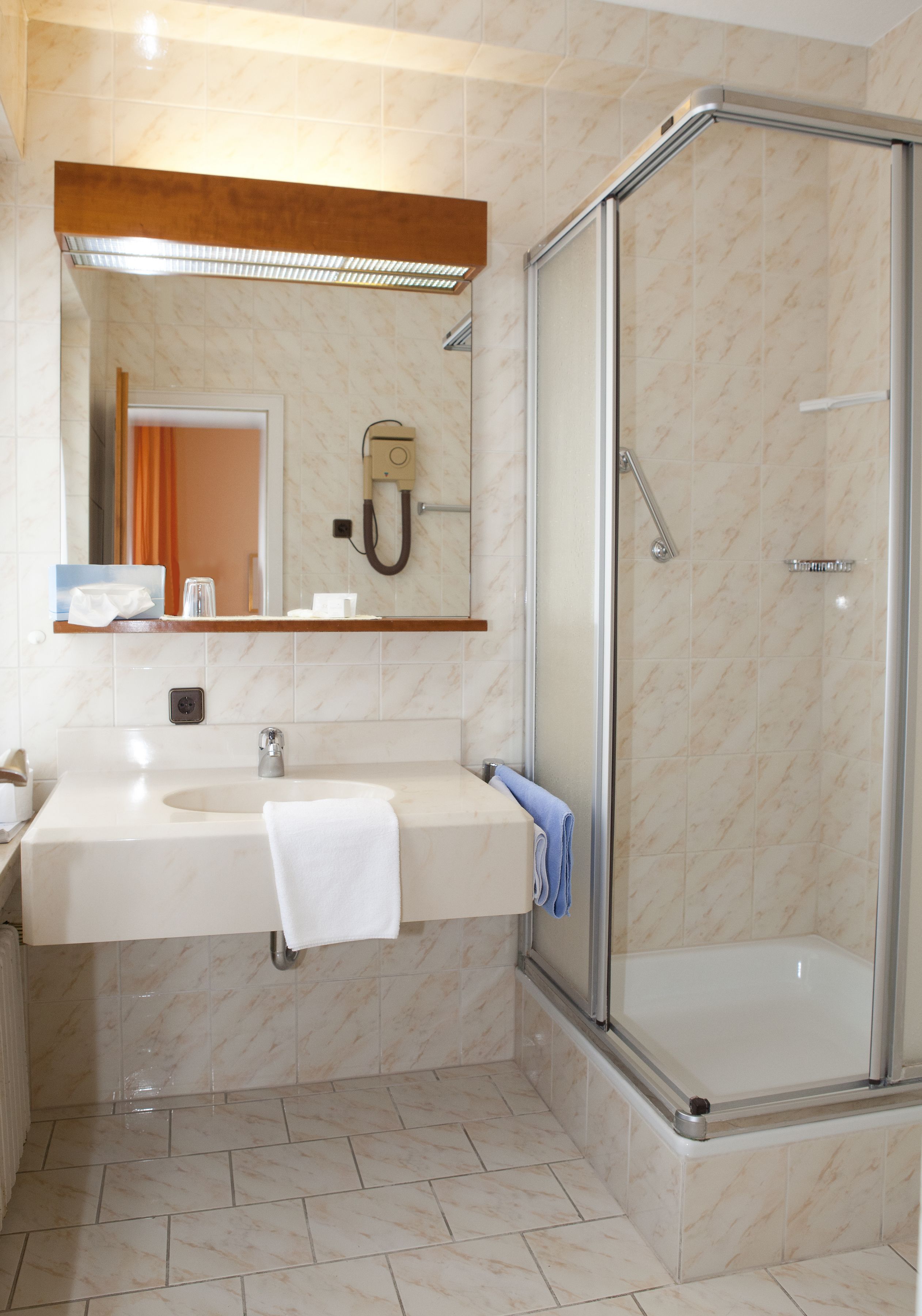 standard single room | bathroom | shower, hair dryer, bathrobes, towels