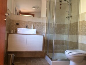Shower, bathrobes, bidet