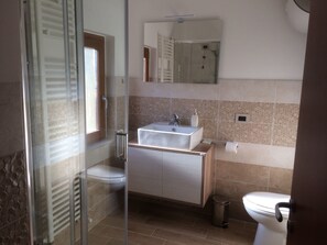 Shower, bathrobes, bidet
