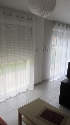 Appartement, en-suite badkamer, uitzicht op tuin | Lounge