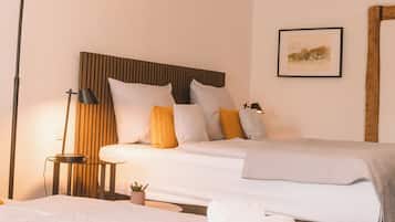 Colchones con efecto memoria y caja de seguridad en la habitaciĂłn