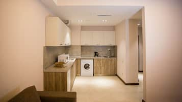 Apartment, 1 Bedroom | Private kitchen | Fridge, microwave, cookware/dishes/utensils