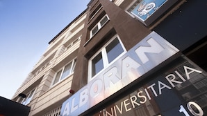 A building with the sign 'ALBORAN' and 'Residencia Universitaria' indicating it is a university residence. - Residencia Universitaria Alboran (Málaga)