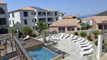 Seasonal outdoor pool, pool umbrellas, sun loungers