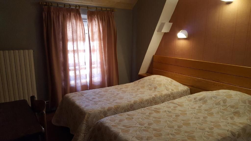 Quarto duplo clássico, vista para o pátio | Cortinas blackout, Wi-Fi de cortesia